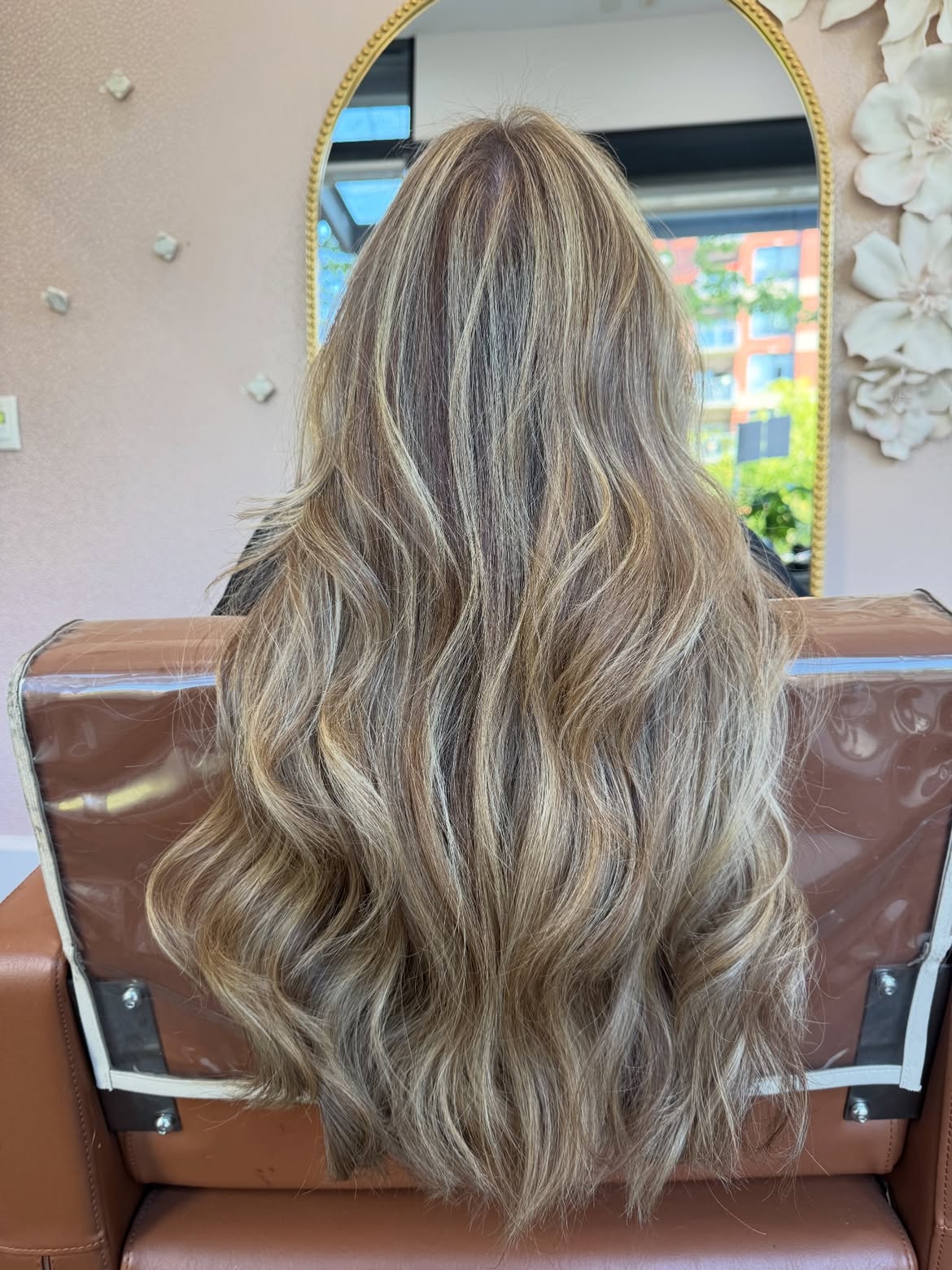 Extension result with beige-blonde highlights