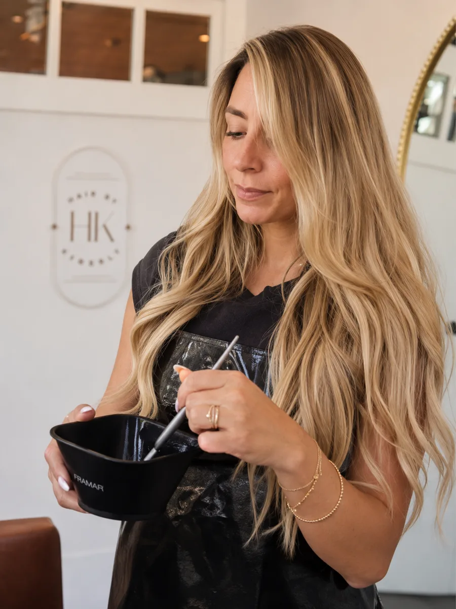 Kathely preparing a custom hair colour formulation